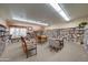 Well-lit library with floor-to-ceiling bookshelves, offering a quiet space for reading and relaxation at 2101 S Meridian Rd # 146, Apache Junction, AZ 85120