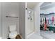 Bathroom featuring a toilet, glass shower, and doorway to a walk-in closet at 2101 S Meridian Rd # 146, Apache Junction, AZ 85120