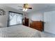 Bedroom featuring a window with curtains, and two dressers for ample storage at 2101 S Meridian Rd # 146, Apache Junction, AZ 85120