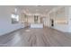 Open floorplan featuring a kitchen with island, ample counter space, and stainless steel appliances at 21436 W Meadowbrook Ave, Buckeye, AZ 85396