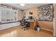 Bright home office featuring a built-in window seat with storage and a modern, comfortable workspace at 2217 W Claremont St, Phoenix, AZ 85015