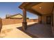Enjoy the covered back patio overlooking the expansive backyard space at 23162 E Canary Way, Queen Creek, AZ 85142