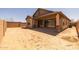 Large backyard with covered patio and privacy wall at 23162 E Canary Way, Queen Creek, AZ 85142