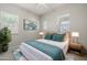 Inviting bedroom with large windows, complemented by stylish decor and ample natural light at 23162 E Canary Way, Queen Creek, AZ 85142