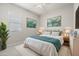 Serene bedroom with a cozy rug, complemented by calming decor and ample natural light at 23162 E Canary Way, Queen Creek, AZ 85142