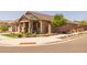 Beautiful corner lot with mature landscaping and sidewalk access on a sunny day at 23162 E Canary Way, Queen Creek, AZ 85142