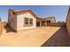 View of backyard, showing ample space and block wall fence for privacy at 23163 E Canary Way, Queen Creek, AZ 85142