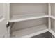 Walk-in closet features built-in shelving and ample storage space at 23163 E Canary Way, Queen Creek, AZ 85142