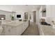 Contemporary kitchen offers a large island, granite countertops, and seamless access to living space at 23163 E Canary Way, Queen Creek, AZ 85142