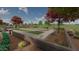 Lawn bowling with a water view, a great place for community fun in a relaxed setting at 23163 E Canary Way, Queen Creek, AZ 85142