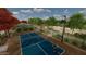 Active pickleball courts with landscaping, encouraging an active and social lifestyle at 23163 E Canary Way, Queen Creek, AZ 85142