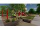 A large playground with shade structures, picnic tables and benches surrounded by green space within the community at 23163 E Canary Way, Queen Creek, AZ 85142
