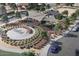 Aerial view of a community park featuring a playground, picnic area, and landscaped surroundings, perfect for families at 2437 W Jessica Ln, Phoenix, AZ 85041