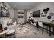 Cozy living space with stylish decor, modern furniture, and a sleek entertainment setup, perfect for relaxing at 2437 W Jessica Ln, Phoenix, AZ 85041