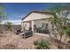 Inviting covered patio with stylish outdoor furniture, perfect for al fresco dining and entertaining guests at 2437 W Jessica Ln, Phoenix, AZ 85041