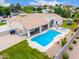 A high angle of a well maintained pool and spa, and tidy backyard landscaping at 2505 E Lehi Rd # 16, Mesa, AZ 85213