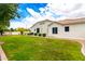 Expansive backyard featuring lush green grass and privacy landscaping, perfect for outdoor activities at 2505 E Lehi Rd # 16, Mesa, AZ 85213