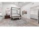 Bright bedroom featuring a four-poster bed, soft decor, and natural light, offering a calming personal space at 2505 E Lehi Rd # 16, Mesa, AZ 85213