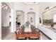 Elegant dining room with hardwood floors and modern accents creates an inviting space for entertaining guests at 2505 E Lehi Rd # 16, Mesa, AZ 85213