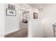 Upper hallway view into the main bedroom featuring modern furnishings and decor at 2505 E Lehi Rd # 16, Mesa, AZ 85213