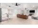 Spacious living room with wood flooring, recessed lighting, and modern furnishings at 2505 E Lehi Rd # 16, Mesa, AZ 85213