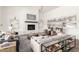Bright living room featuring a fireplace, comfortable seating, and stylish decor at 2505 E Lehi Rd # 16, Mesa, AZ 85213