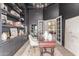 Stylish office featuring custom built-in shelving, desk, and elegant lighting, perfect for a productive workspace at 2505 E Lehi Rd # 16, Mesa, AZ 85213