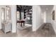 Home office with built-in shelving, hardwood floors, and natural light at 2505 E Lehi Rd # 16, Mesa, AZ 85213