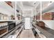 Walk-in pantry featuring abundant shelving, countertop space, and appliance storage at 2505 E Lehi Rd # 16, Mesa, AZ 85213