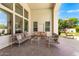 Covered patio with comfortable seating, perfect for outdoor entertaining and relaxing at 2505 E Lehi Rd # 16, Mesa, AZ 85213