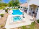 A sparkling in ground spa with a raised brick facade is next to a tidy pool at 2505 E Lehi Rd # 16, Mesa, AZ 85213