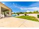 Inviting backyard pool with covered patio area and well-maintained landscaping, great for relaxing at 2505 E Lehi Rd # 16, Mesa, AZ 85213