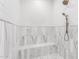 Elegant marble shower with built-in seating and modern fixtures, providing a spa-like experience at home at 2505 E Lehi Rd # 16, Mesa, AZ 85213