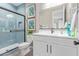 Beautiful bathroom featuring a walk-in shower and sleek modern vanity at 2637 N 195Th Dr, Buckeye, AZ 85396