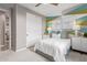 Comfortable bedroom with a queen sized bed, designer wall accents, and closet at 2637 N 195Th Dr, Buckeye, AZ 85396