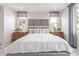 Bedroom featuring neutral tones, coordinated wall art, and stylish furnishings at 2637 N 195Th Dr, Buckeye, AZ 85396