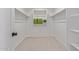 Walk-in closet includes shelving for ample storage at 2637 N 195Th Dr, Buckeye, AZ 85396