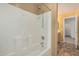 Shower and bath combo, a white shower head, and tile at 2794 E Cowboy Cove Trl, San Tan Valley, AZ 85143