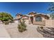 Attractive single-Gathering home with desert landscaping and a convenient two-car garage at 2794 E Cowboy Cove Trl, San Tan Valley, AZ 85143