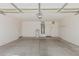 Spacious, clean garage featuring multiple doors at 2794 E Cowboy Cove Trl, San Tan Valley, AZ 85143