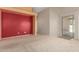 Open-concept living area showcases a unique accent wall, and sliding glass door at 2794 E Cowboy Cove Trl, San Tan Valley, AZ 85143