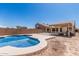 Backyard pool with a large covered patio and privacy fence, perfect for outdoor entertaining at 2794 E Cowboy Cove Trl, San Tan Valley, AZ 85143