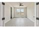 An empty bedroom is brightly lit by two large windows at 31505 N 166Th Pl, Scottsdale, AZ 85262