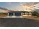 Beautiful home featuring a neutral color scheme, concrete driveway, and three-car garage at 31505 N 166Th Pl, Scottsdale, AZ 85262
