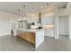 Stylish kitchen with granite counters, center island, and white shaker cabinets at 31505 N 166Th Pl, Scottsdale, AZ 85262