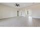 A large and open living room with recessed lights and tile flooring at 31505 N 166Th Pl, Scottsdale, AZ 85262