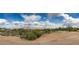 Scenic view of the property overlooking the desert landscape and mountains at 31505 N 166Th Pl, Scottsdale, AZ 85262