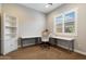 Bright office with a large window with shutters and an ample workspace at 32268 N 133Rd Ln, Peoria, AZ 85383
