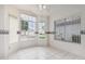 Bright dining area with large windows and tile flooring, perfect for Gathering meals at 3349 E Lavey Ln, Phoenix, AZ 85032