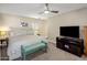 Inviting bedroom with a plush bed, a TV, and modern decor, offering a comfortable and relaxing atmosphere at 3630 N 39Th St, Phoenix, AZ 85018